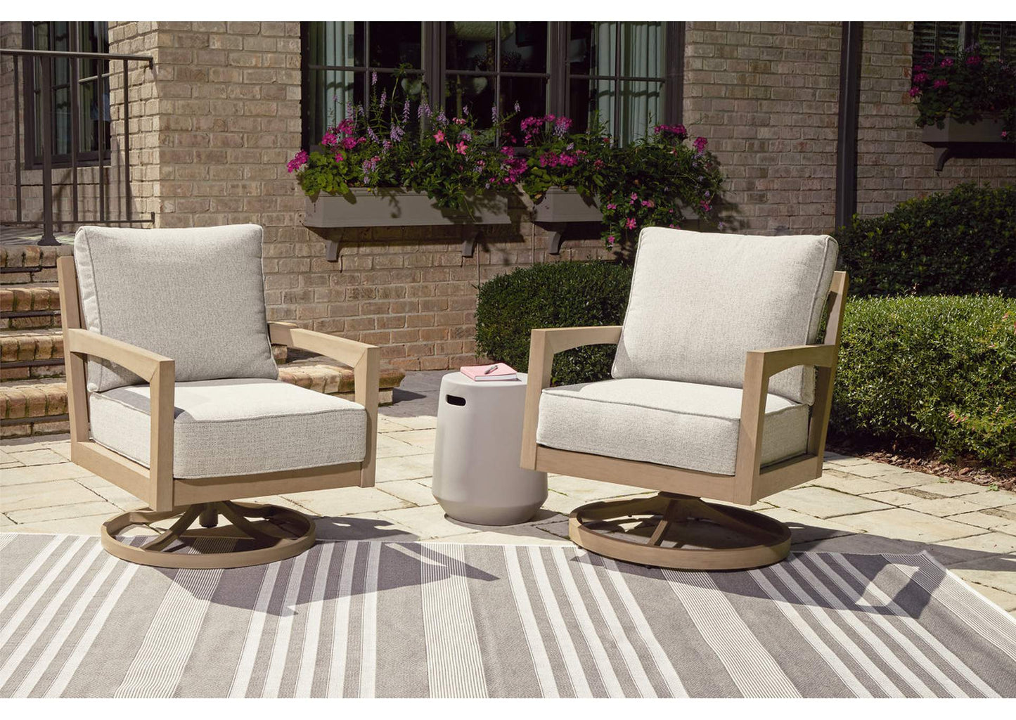 Hallow Creek Outdoor Swivel Lounge with Cushion